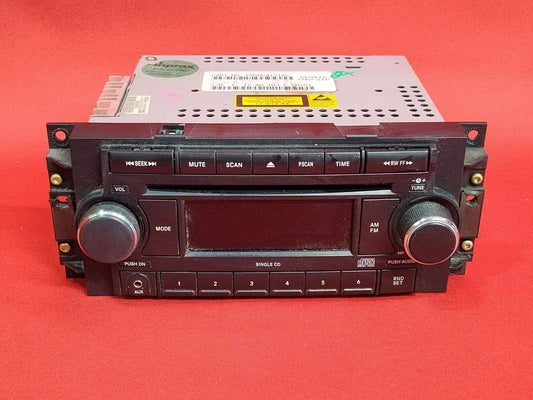 2006-2009 Jeep Dodge AM/FM Radio w/ Single CD + AUX Auxiliary Port