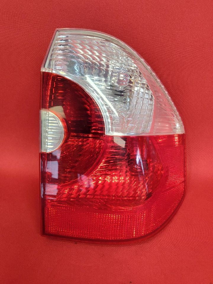 2004-2006 BMW X3 Right Passenger Quarter Mounted Outer Tail Light Lamp (Clear)